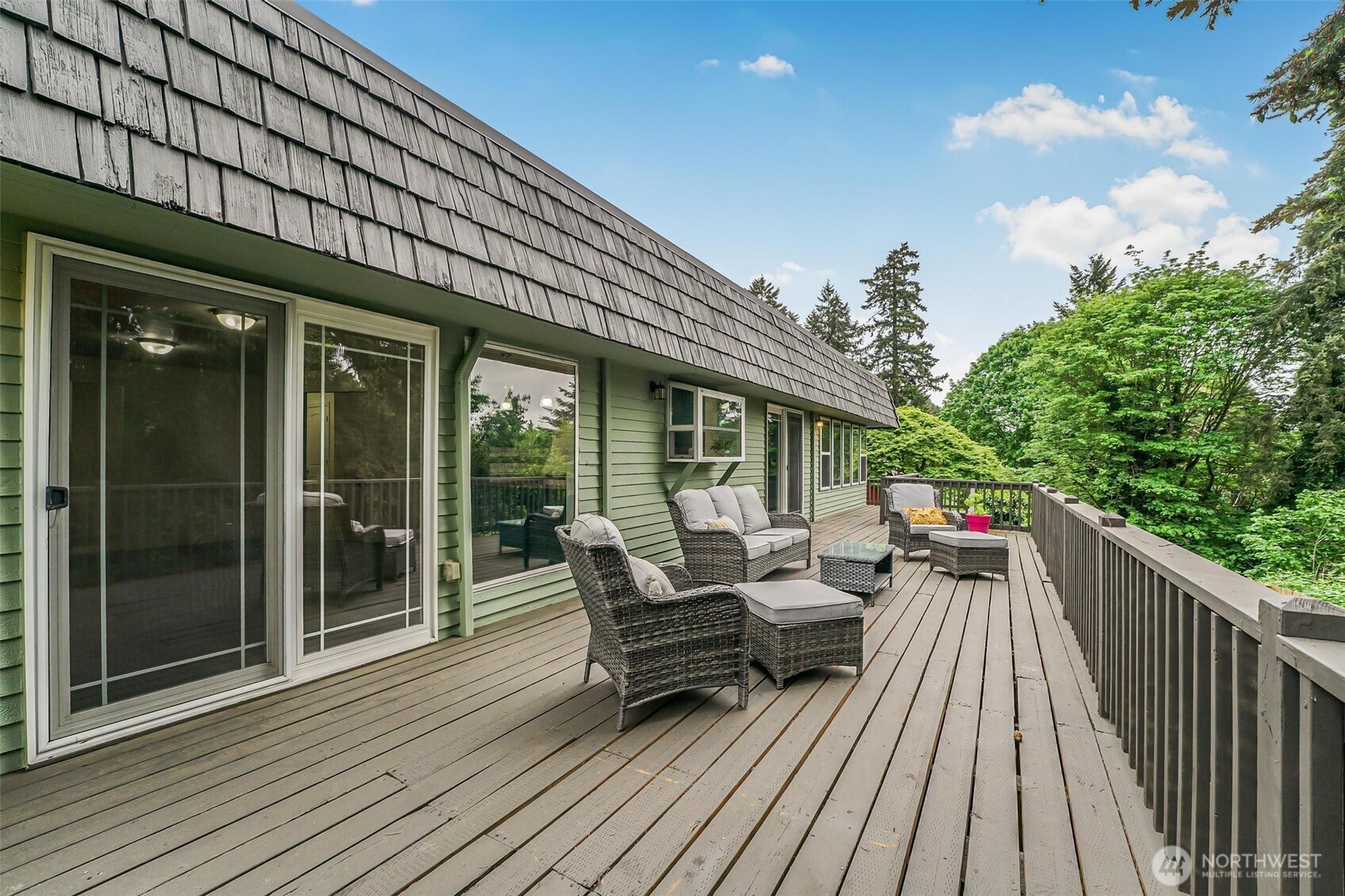 11404 Karshner Road East Edgewood, WA 98372 - Photo 33 of 40 a view of a two chair and tables in the balcony