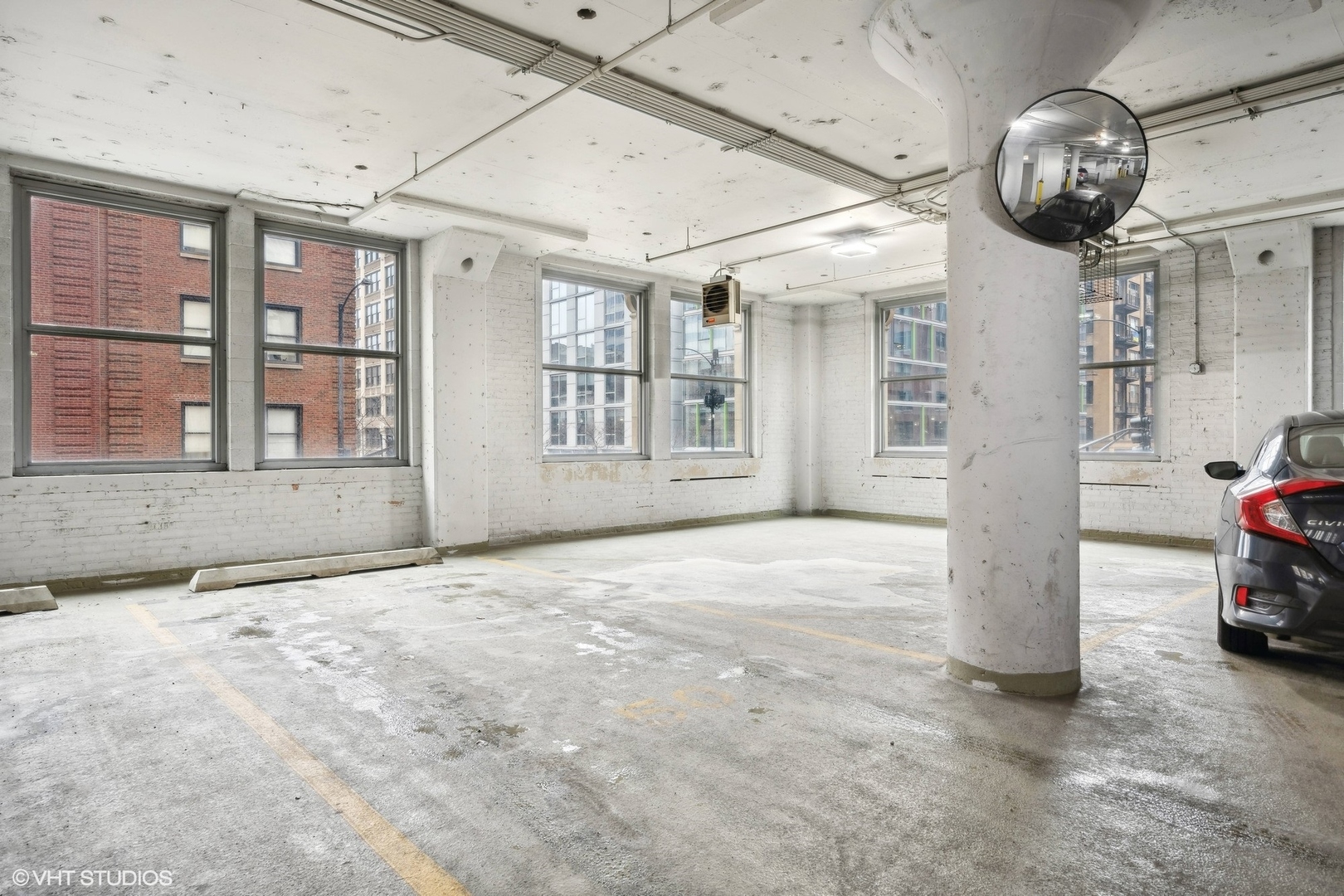 565 West Quincy Street, Unit 902 Chicago, IL 60661 - Photo 15 of 26 a view of an empty room with a window