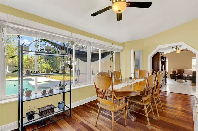 a view of a dining room with furniture window and outside view