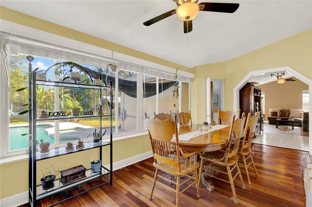 1007 Tony Circle St. Cloud, FL 34772 - Photo 17 of 20 a view of a dining room with furniture window and outside view