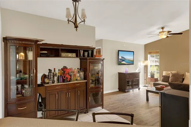 a view of a livingroom with furniture and a window