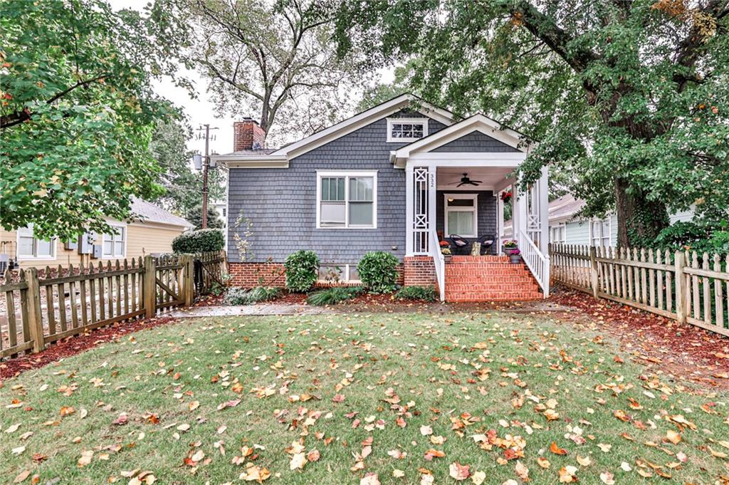 332 West Benson Street Decatur, GA 30030 - Photo 1 of 1 a view of a house with a yard and fence
