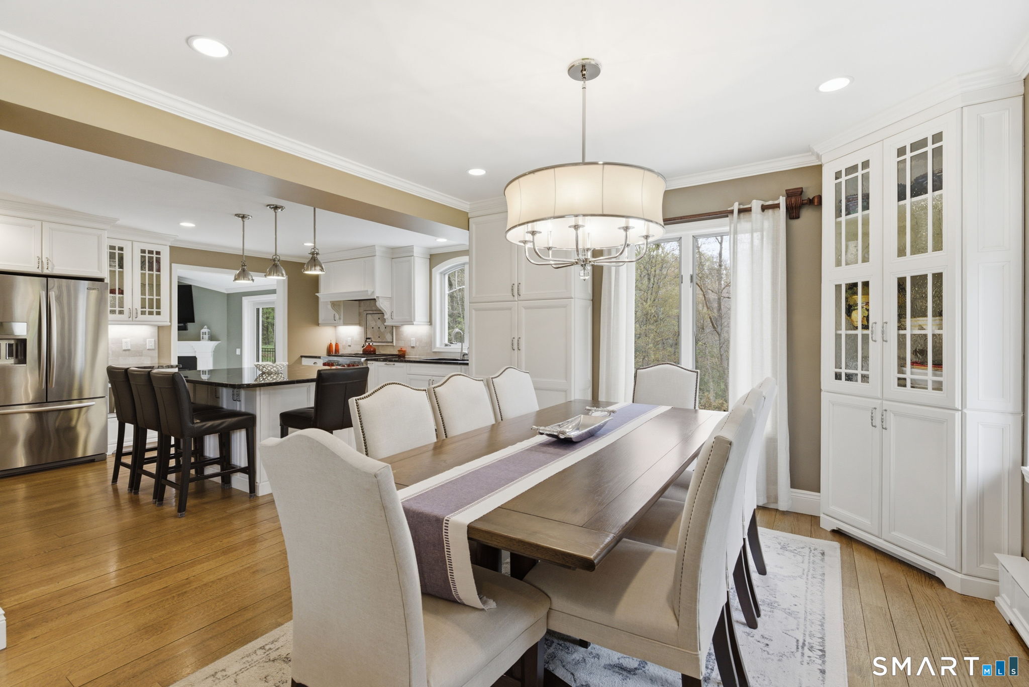 10 Ryans Way Burlington, CT 06013 - Photo 14 of 35 a view of a dining room with furniture window and wooden floor