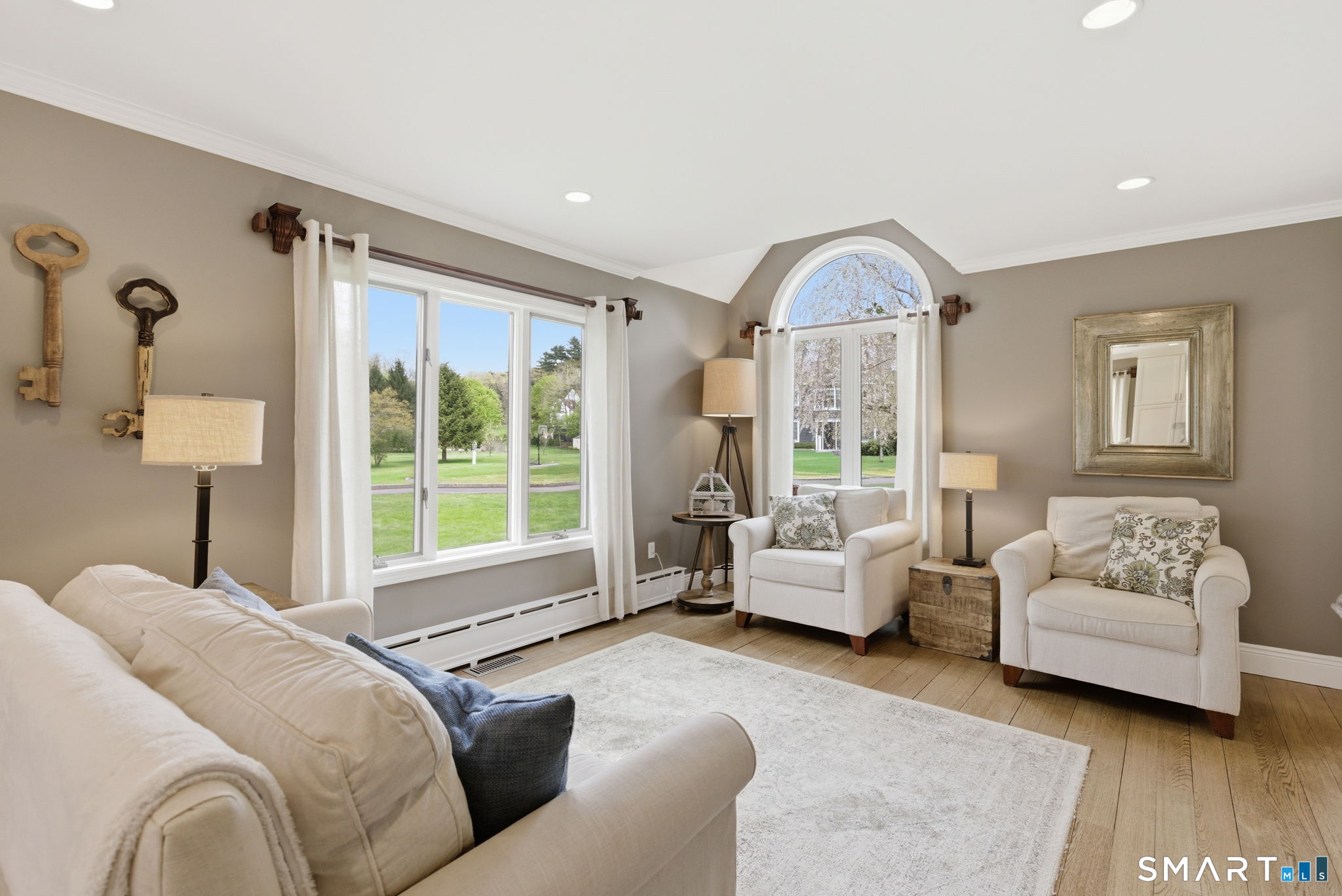 10 Ryans Way Burlington, CT 06013 - Photo 17 of 35 a living room with furniture and a large window