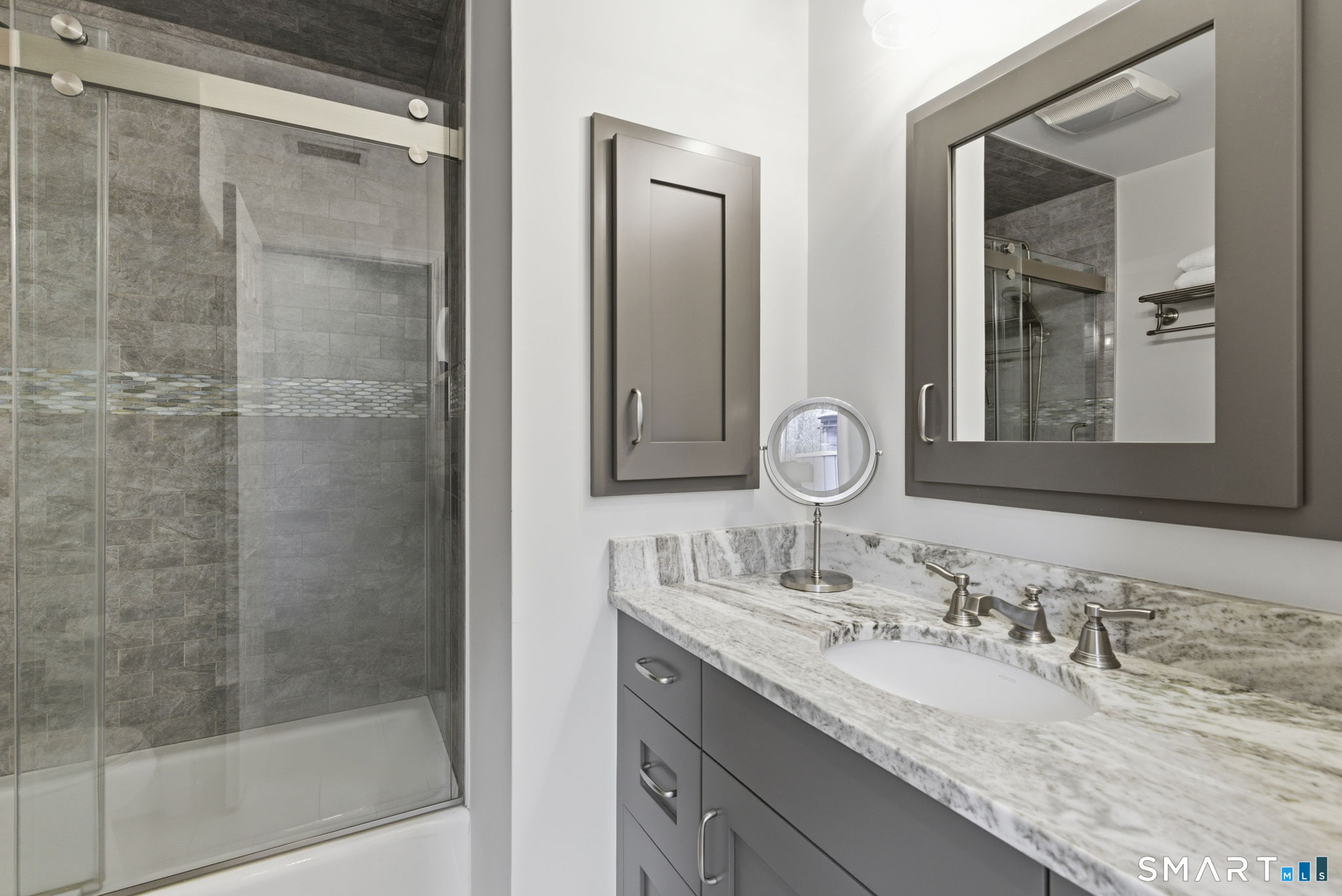 10 Ryans Way Burlington, CT 06013 - Photo 26 of 35 a bathroom with a granite countertop sink mirror and shower