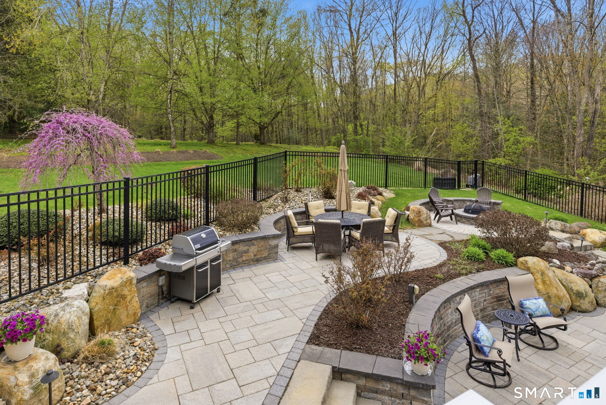 10 Ryans Way Burlington, CT 06013 - Photo 32 of 35 a view of a patio with chairs and table in the patio