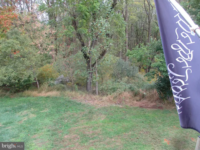 a view of a patio and an ocean view