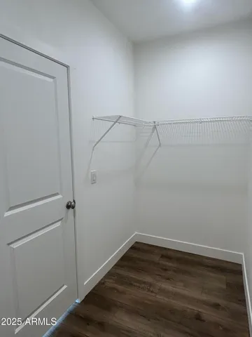 a view of small space with racks on the wall