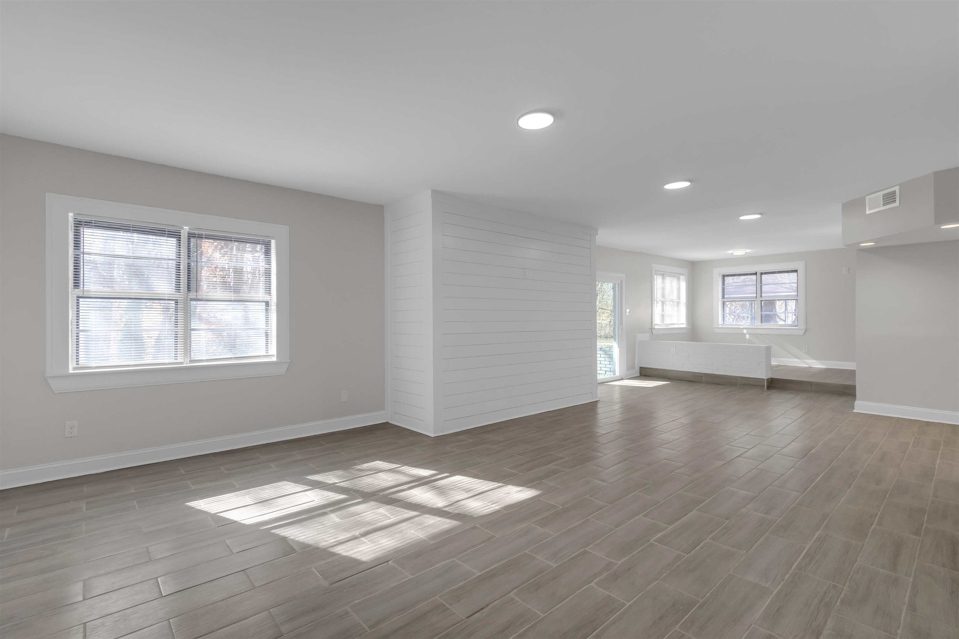 1296 Monasco Road Millington, TN 38053 - Photo 6 of 32 a view of empty room with wooden floor and fan