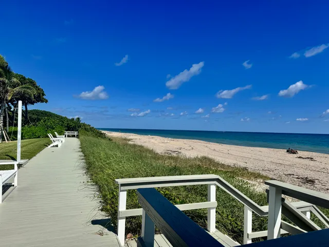 a view of a balcony with an ocean view