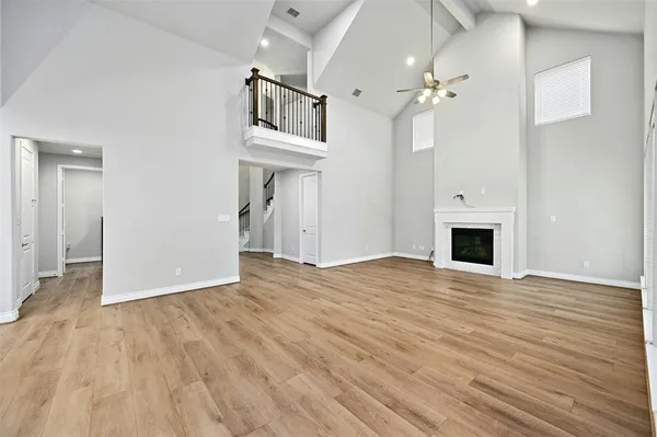 a view of kitchen and kitchen with sink wooden floor