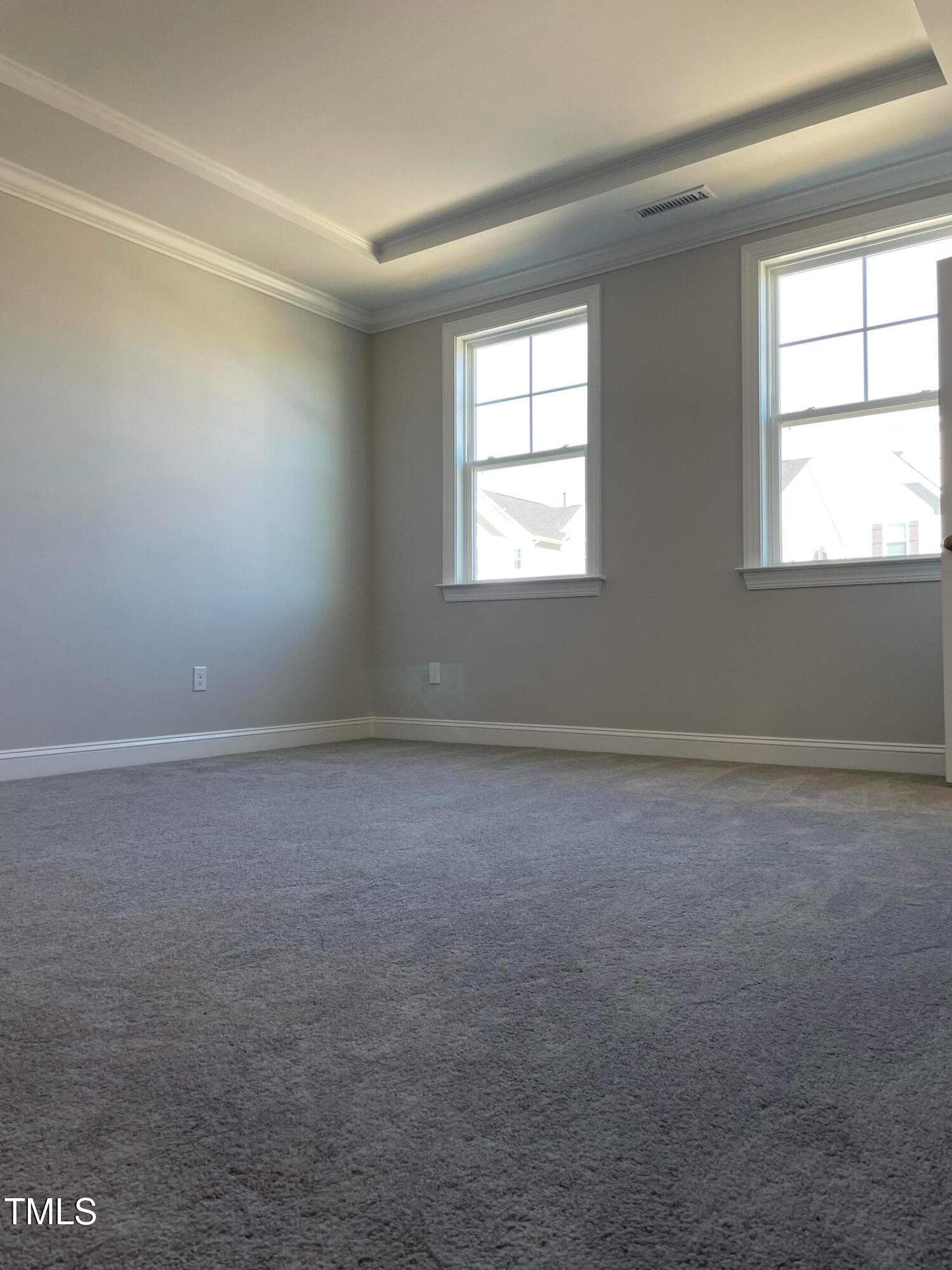 308 Edge Of Auburn Boulevard Raleigh, NC 27610 - Photo 19 of 23 an empty room with a window