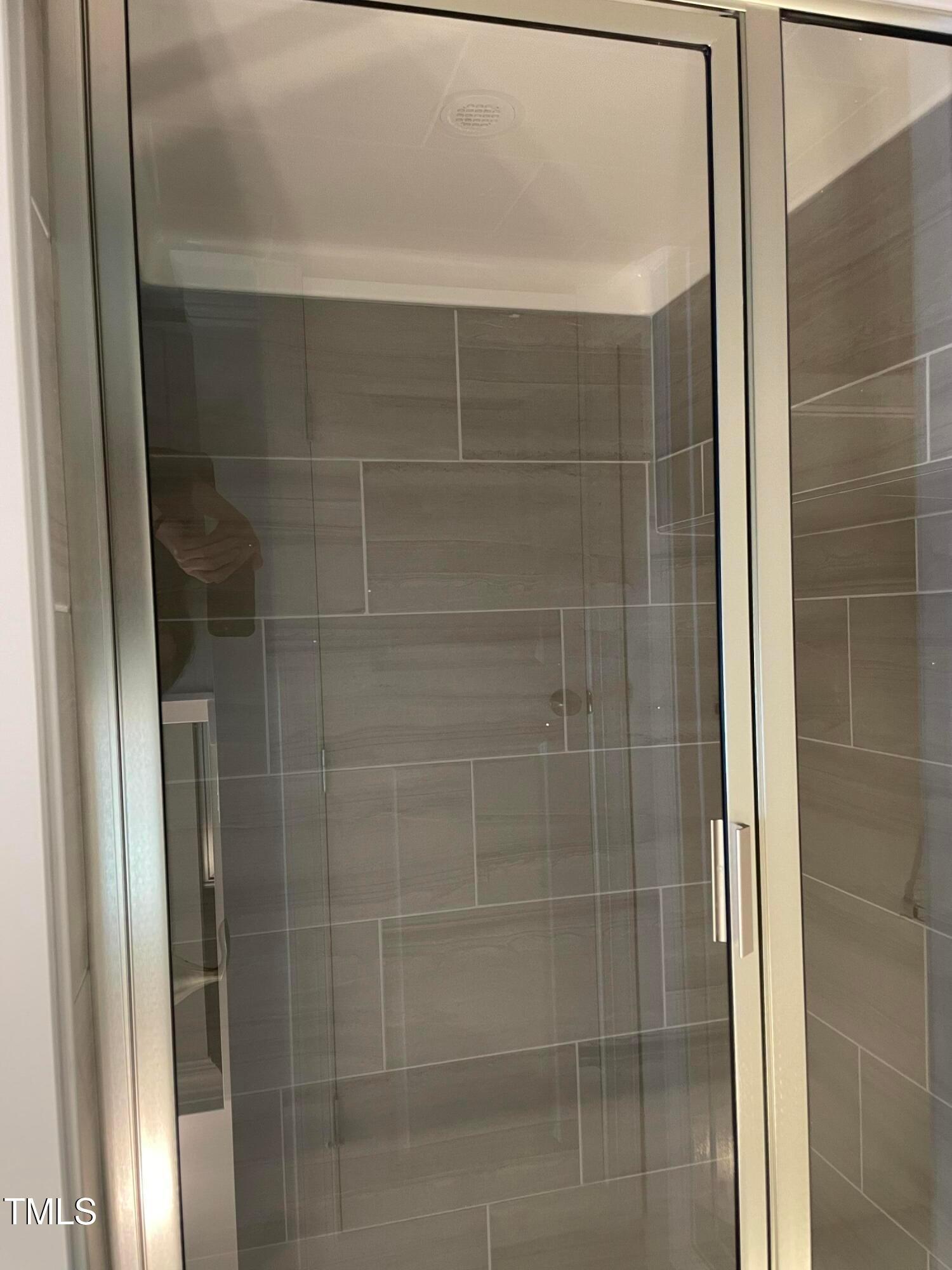 308 Edge Of Auburn Boulevard Raleigh, NC 27610 - Photo 21 of 23 a bathroom with a shower