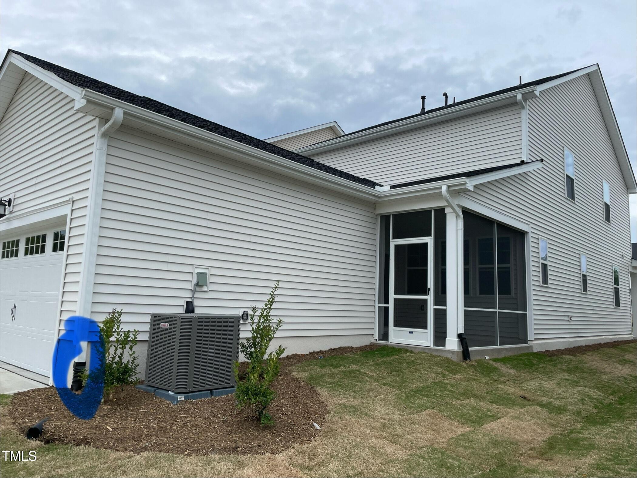 308 Edge Of Auburn Boulevard Raleigh, NC 27610 - Photo 4 of 23 a view of a house with a backyard