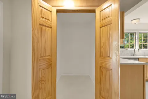 a view of a bathroom with a glass door