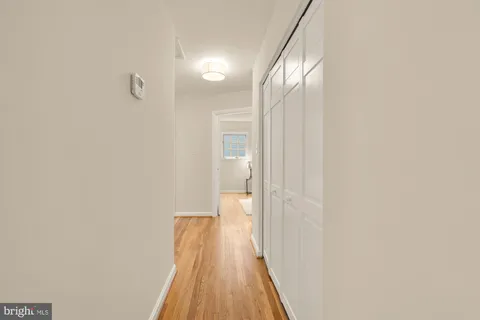 a view of a bathroom from a hallway