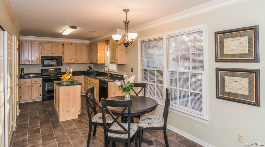 5508 Windy Ridge Drive Midlothian, VA 23112 - Photo 11 of 20 a kitchen with a refrigerator a stove a sink dishwasher a dining table and chairs with wooden floor