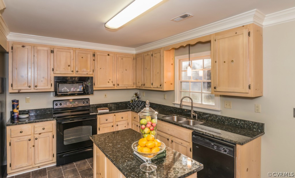 5508 Windy Ridge Drive Midlothian, VA 23112 - Photo 12 of 20 a kitchen with stainless steel appliances granite countertop a stove a sink and a granite counter tops