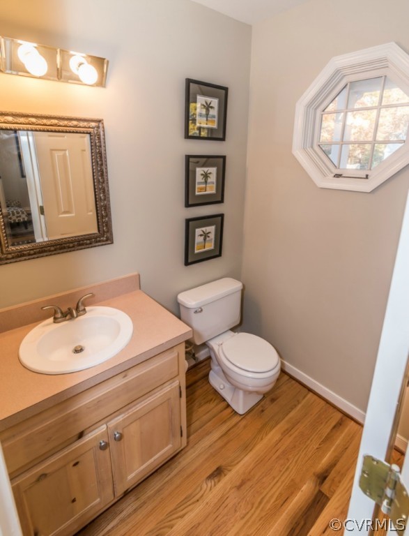 5508 Windy Ridge Drive Midlothian, VA 23112 - Photo 14 of 20 a bathroom with a toilet sink and mirror