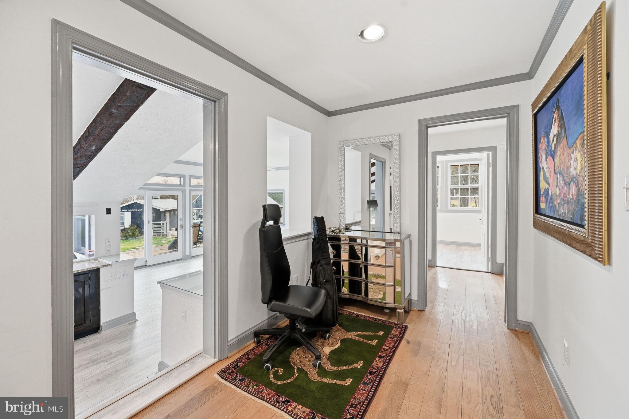 11641 Glen Road Potomac, MD 20854 - Photo 5 of 40 a view of a livingroom with furniture and wooden floor