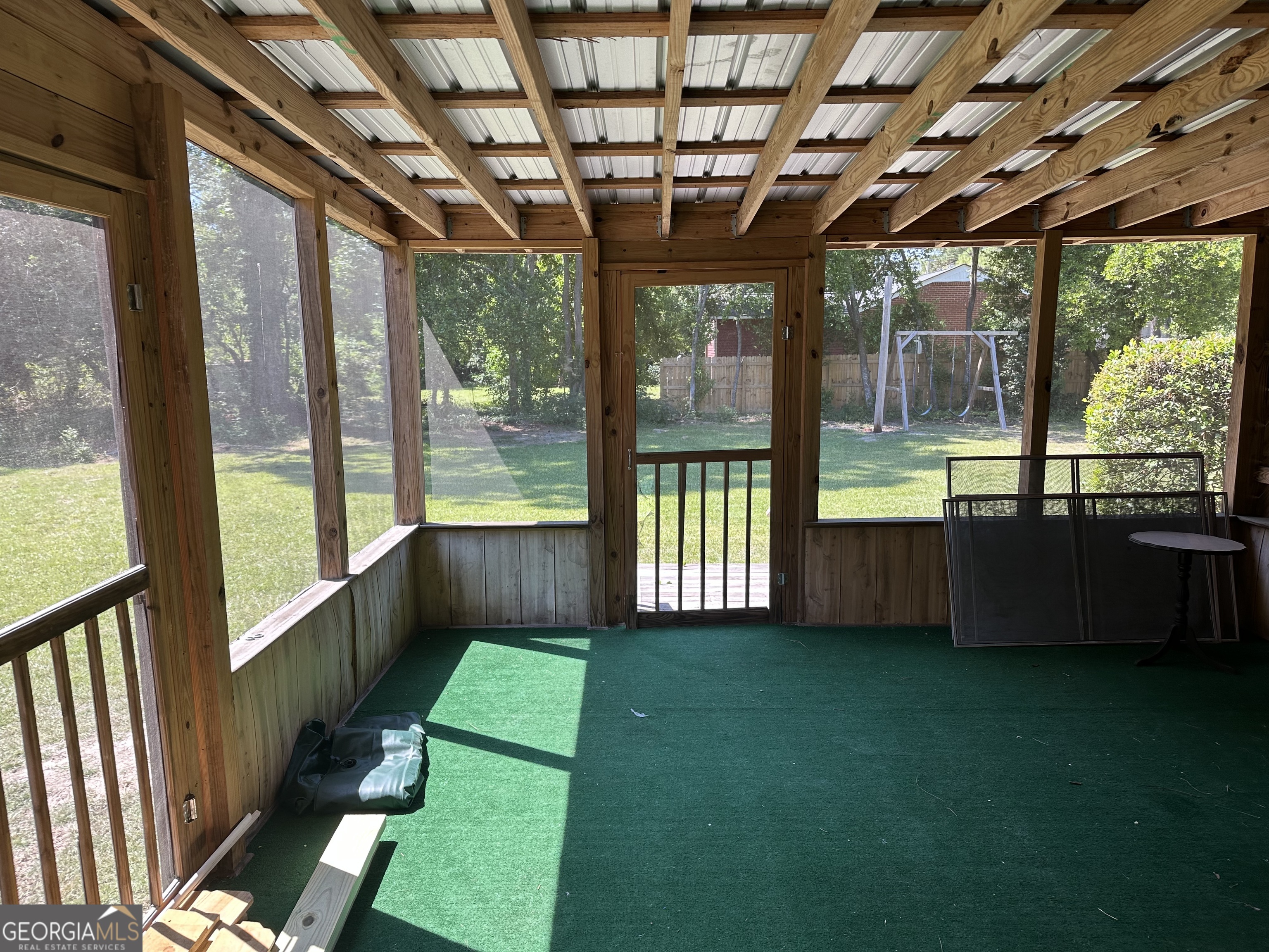202 Geneva Street Dublin, GA 31021 - Photo 14 of 14 a view of yard with a tub and porch