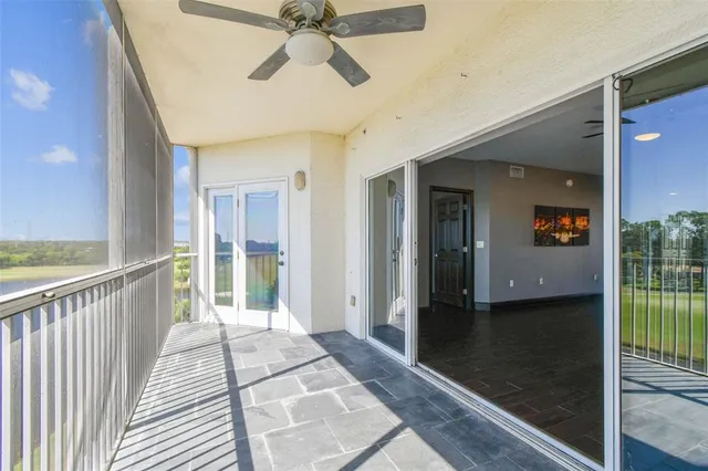 a view of entryway with wooden floor and door