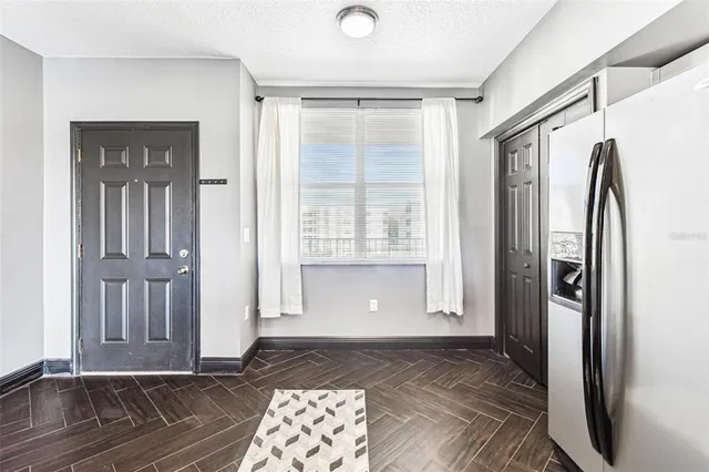 a view of a city with tall buildings