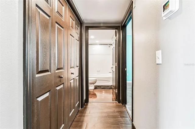 a front view of a building with potted plants