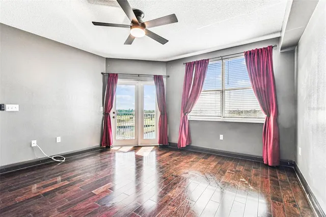 a view of an empty room with a flat screen tv