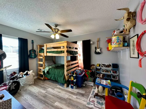 a room with furniture and a gym equipment