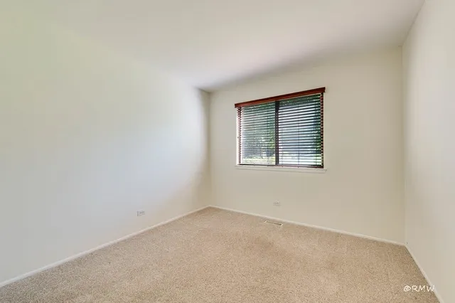 an empty room with closet