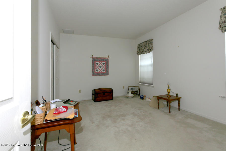 48 Quail Road Barnegat, NJ 08005 - Photo 13 of 19 a living room with furniture and air hockey table