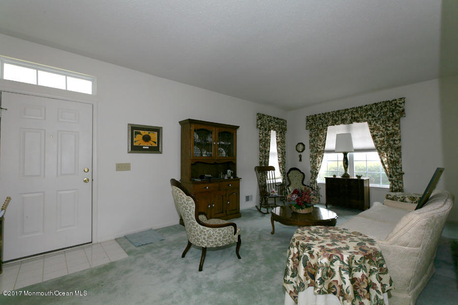 48 Quail Road Barnegat, NJ 08005 - Photo 4 of 19 a living room with furniture and a window
