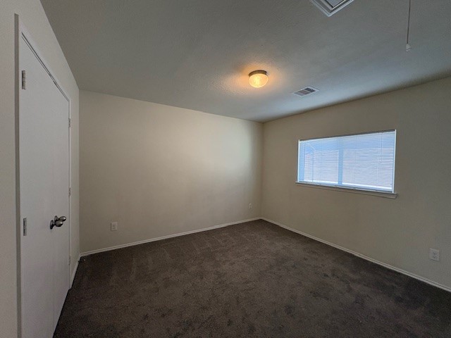 2819 Back Bay Brook Trail Houston, TX 77045 - Photo 14 of 16 an empty room with a empty space and a window