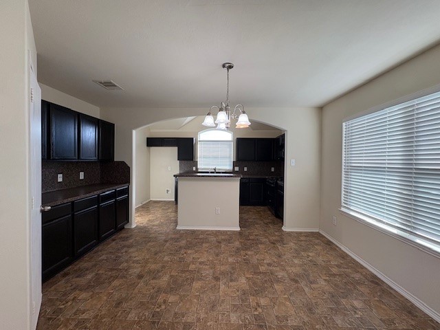 2819 Back Bay Brook Trail Houston, TX 77045 - Photo 6 of 16 a kitchen with granite countertop stainless steel appliances and a window