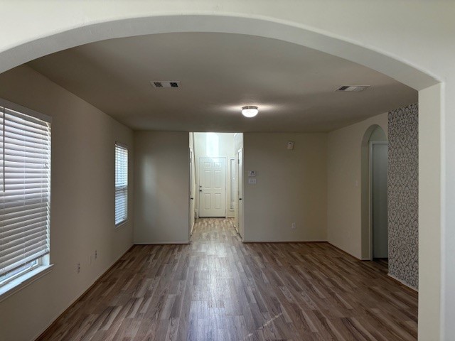 2819 Back Bay Brook Trail Houston, TX 77045 - Photo 10 of 16 a view of a room with wooden floor and window