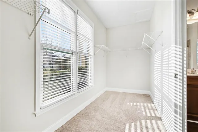 a view of empty room with windows
