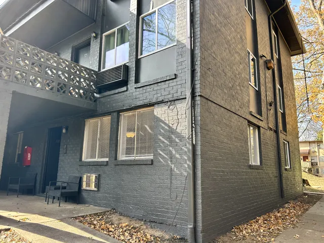 a view of a pathway along the building