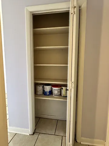 a room with storage and utility