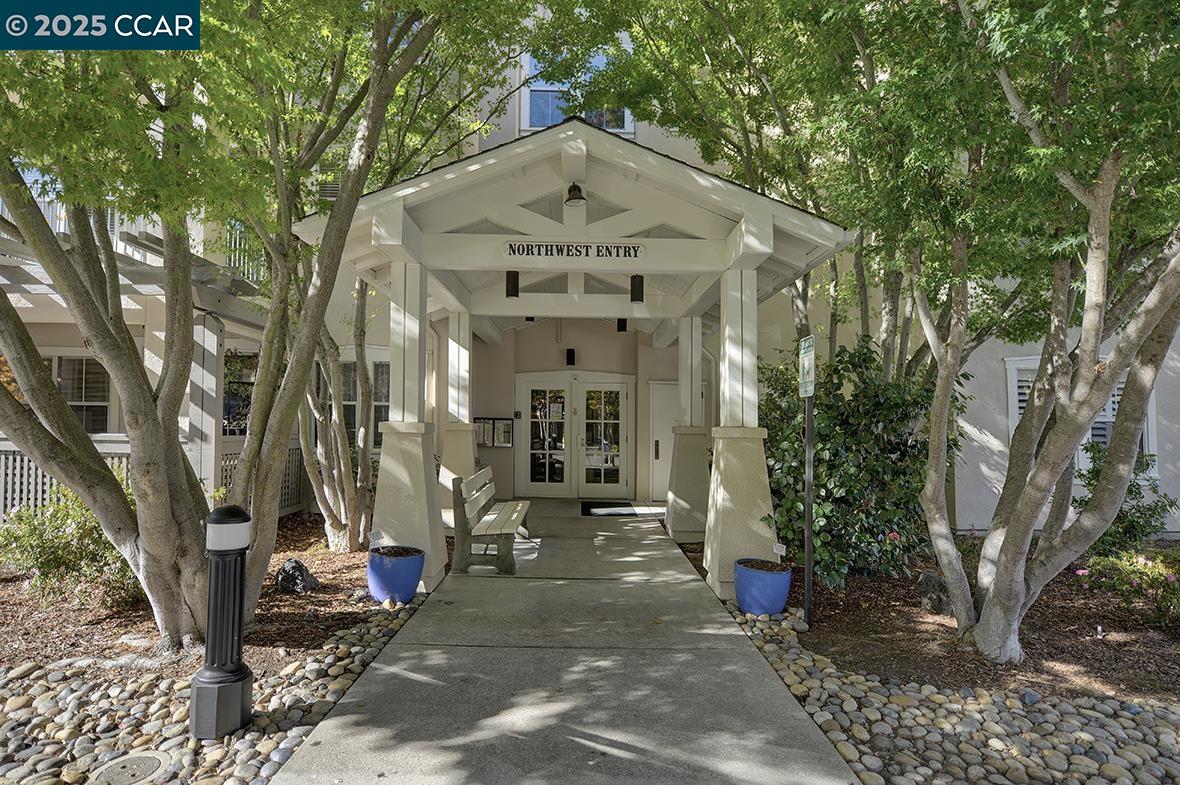 1840 Tice Creek Drive, Unit 2110 Walnut Creek, CA 94595 - Photo 26 of 43 a front view of a house with garden