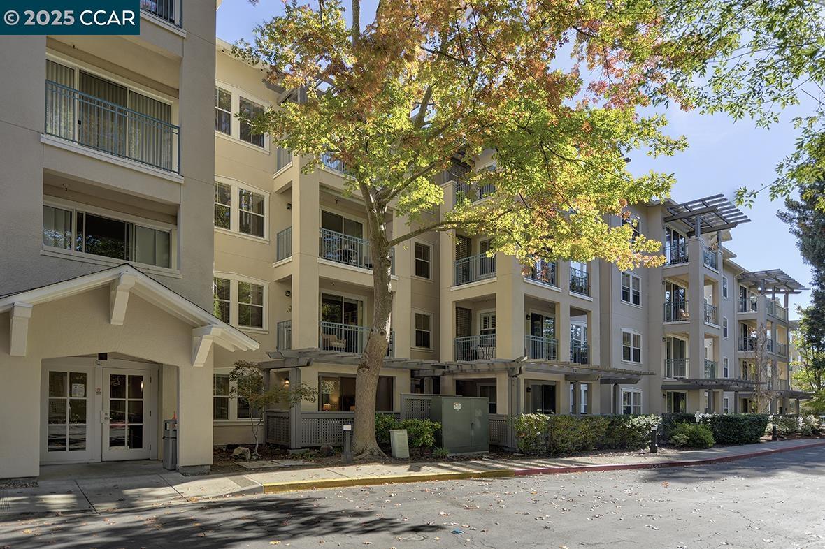 1840 Tice Creek Drive, Unit 2110 Walnut Creek, CA 94595 - Photo 28 of 43 a front view of a building with street view