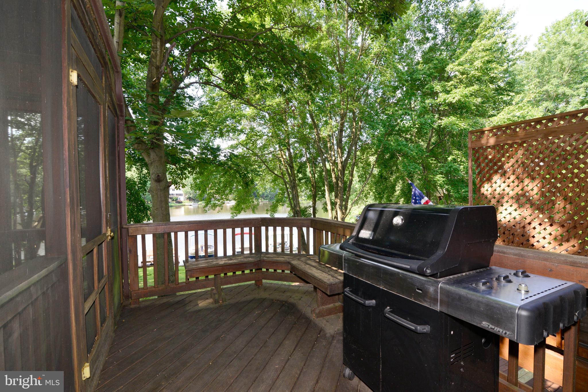 2268 Cedar Cove Court Reston, VA 20191 - Photo 14 of 41 The deck has great views and leads to the porch.
