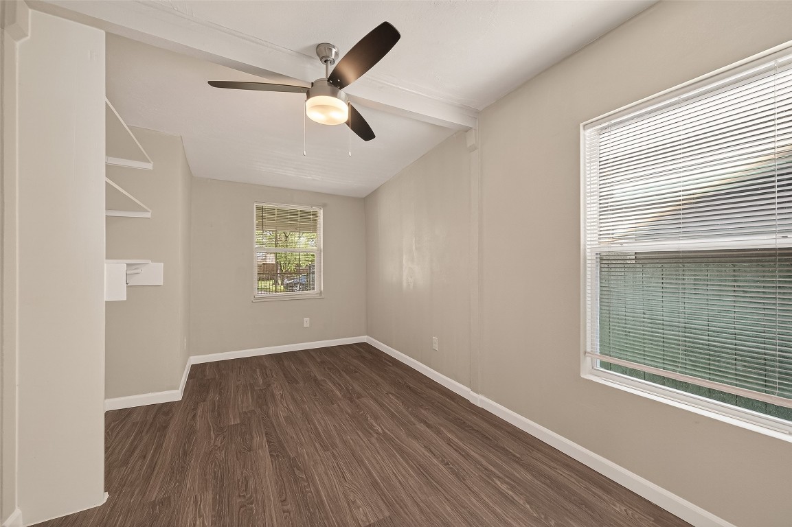 10141 Chadwick Street Houston, TX 77029 - Photo 11 of 25 wooden floor in an empty room with a window