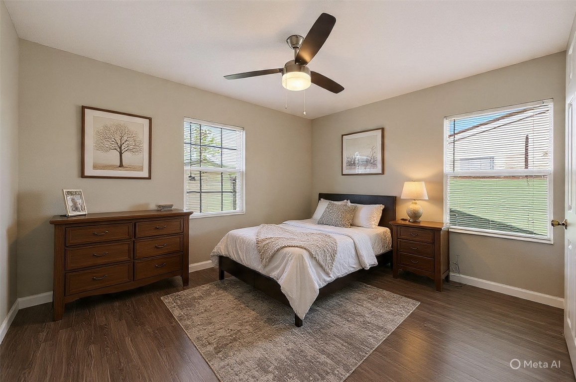 10141 Chadwick Street Houston, TX 77029 - Photo 12 of 25 a spacious bedroom with a bed and a window