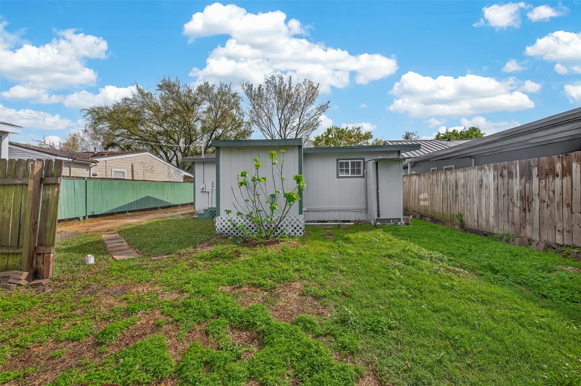 10141 Chadwick Street Houston, TX 77029 - Photo 25 of 25 a view of a house with a backyard