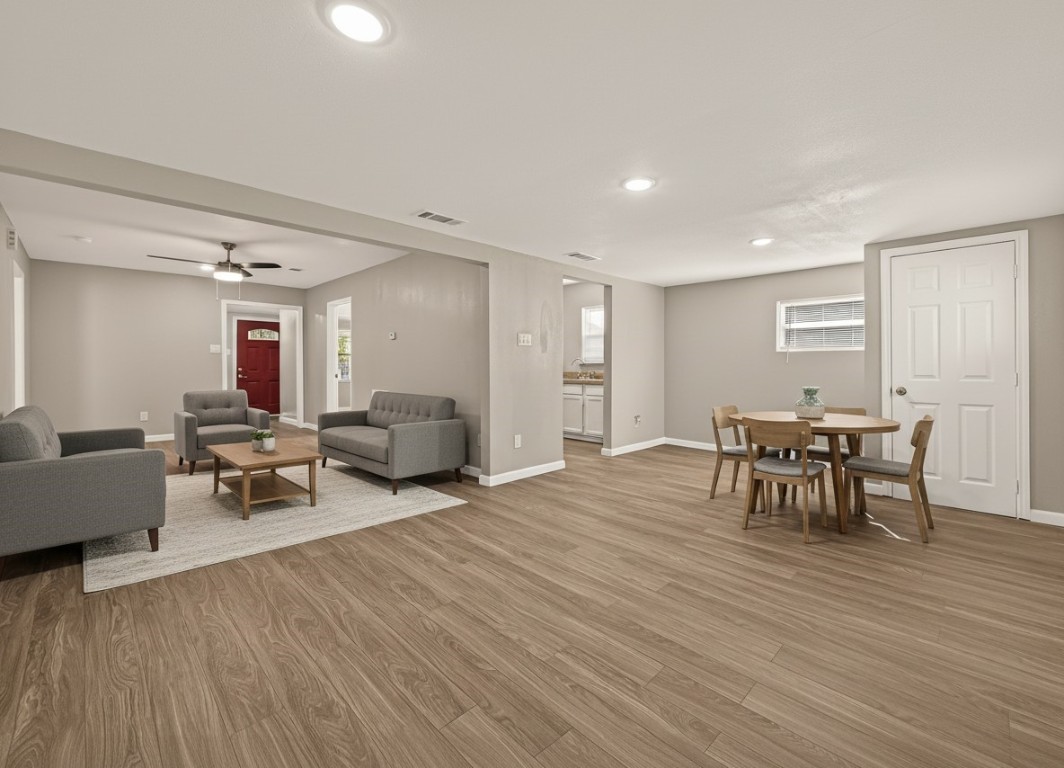 10141 Chadwick Street Houston, TX 77029 - Photo 5 of 25 a living room with furniture and a wooden floor