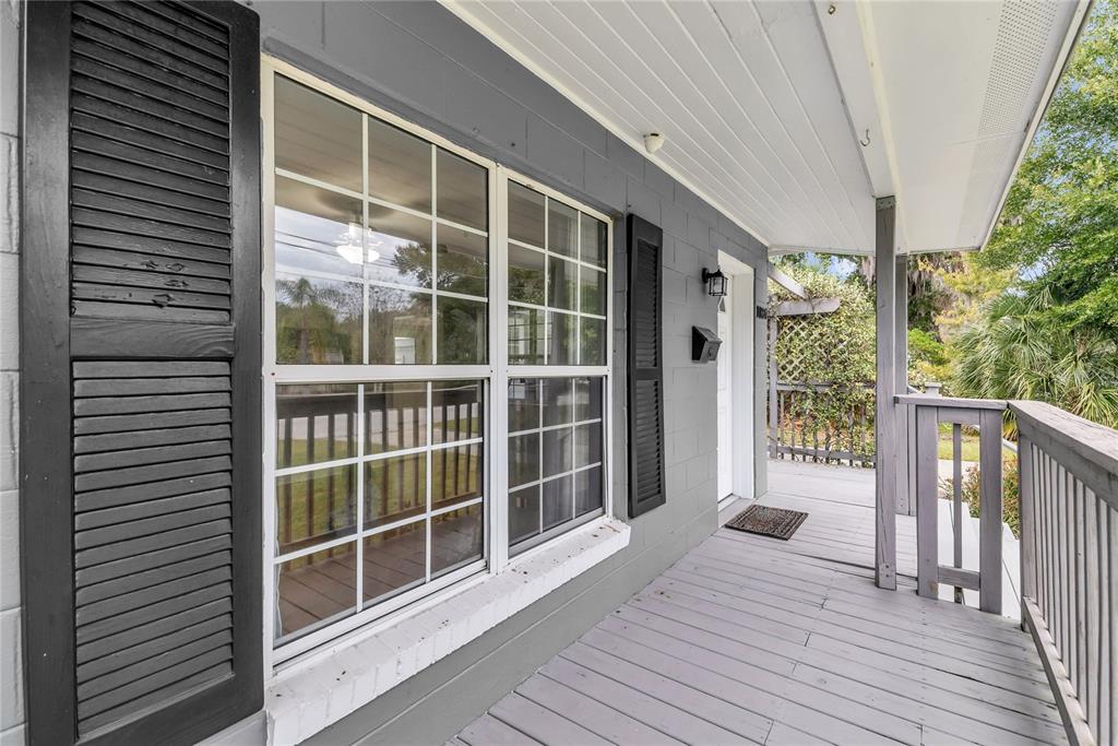 1124 Edgewater Court Orlando, FL 32804 - Photo 4 of 22 a view of a balcony with wooden floor