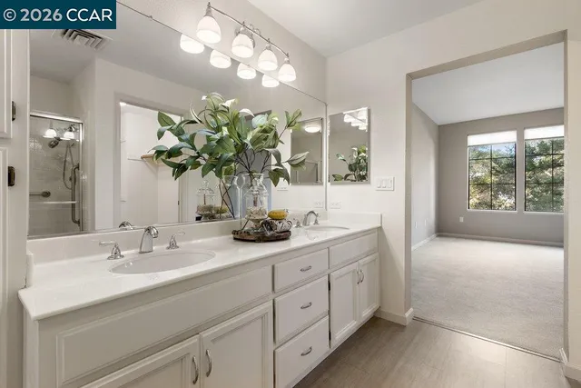 a outdoor living space with furniture and a potted plant