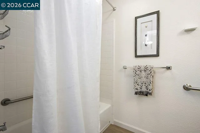 an aerial view of a golf course with parking space