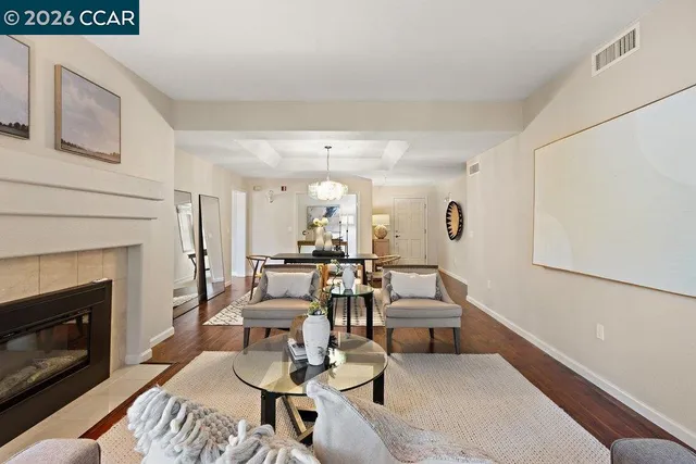 a kitchen with stainless steel appliances granite countertop a sink stove and microwave